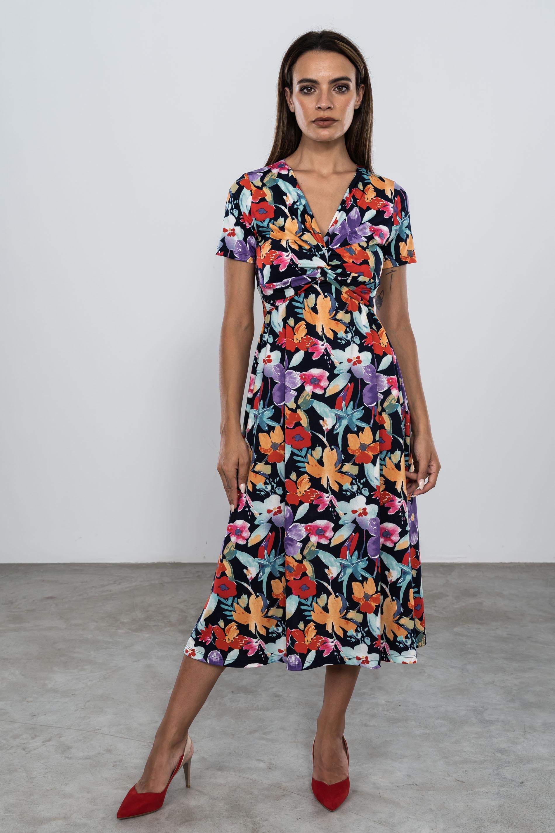 VESTIDO FLORAL DETALLE NUDO
