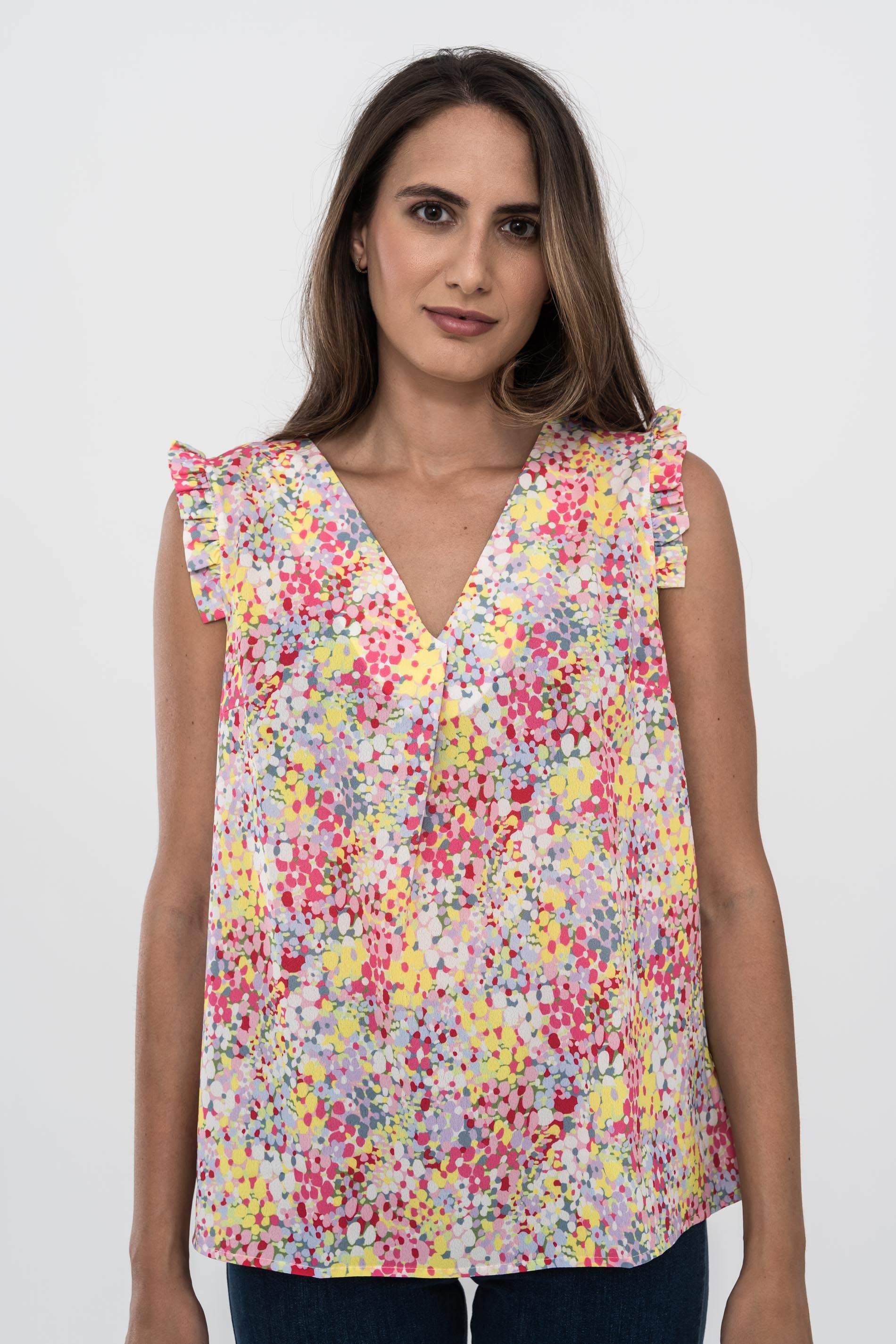 BLUSA VOLANTITO SISA FLORES.