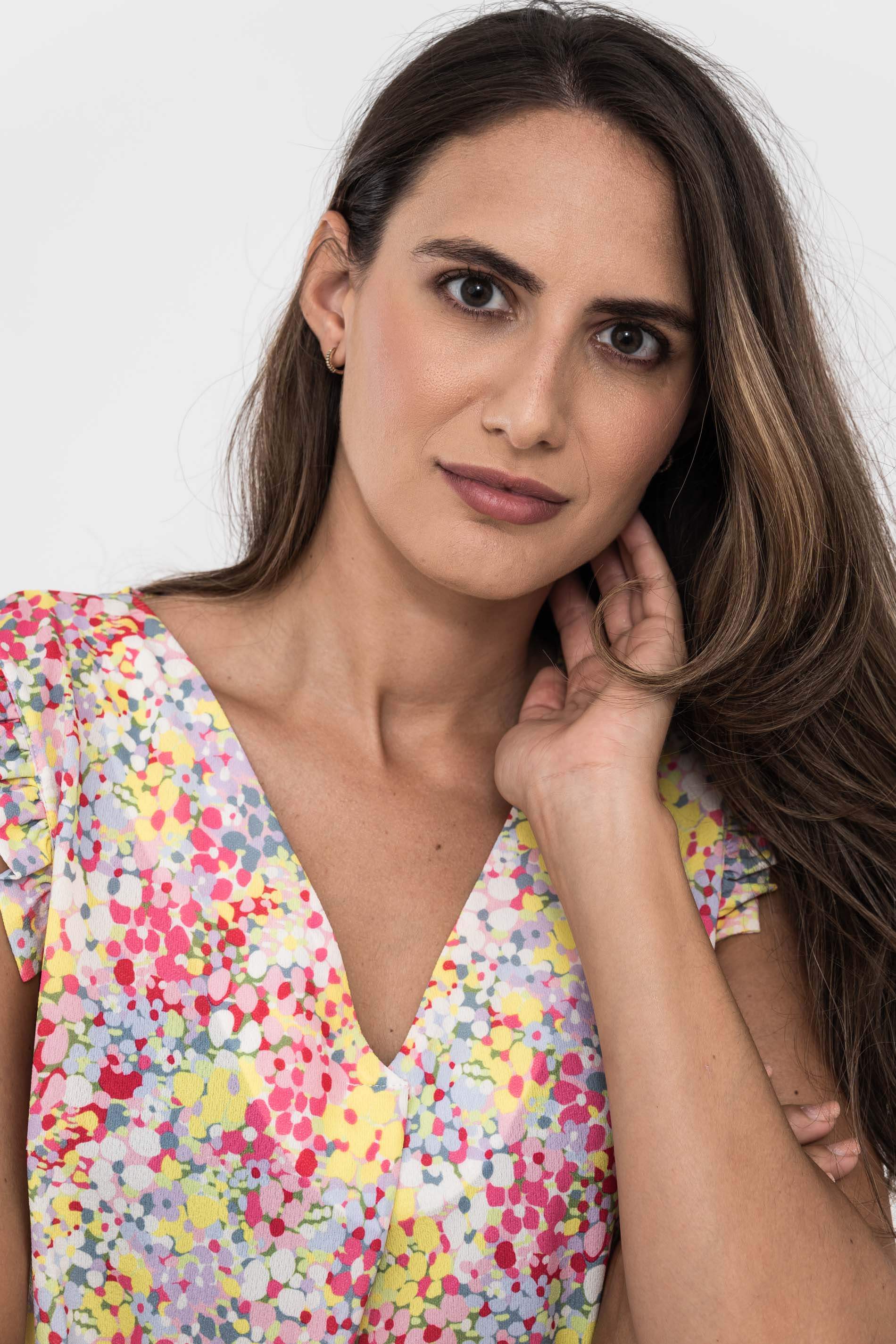 BLUSA VOLANTITO SISA FLORES.