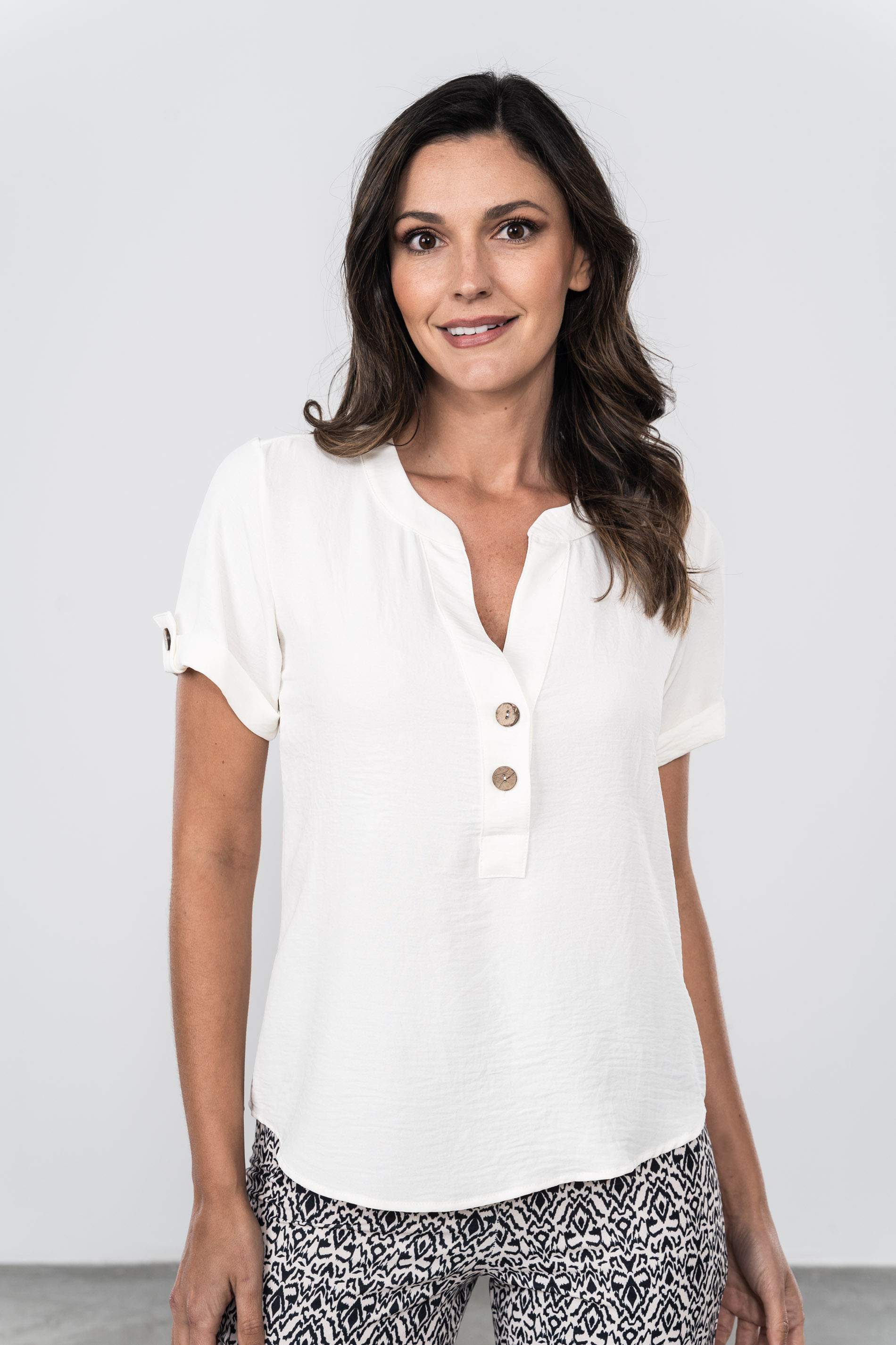 BLUSA BOTONES CUELLO PICO