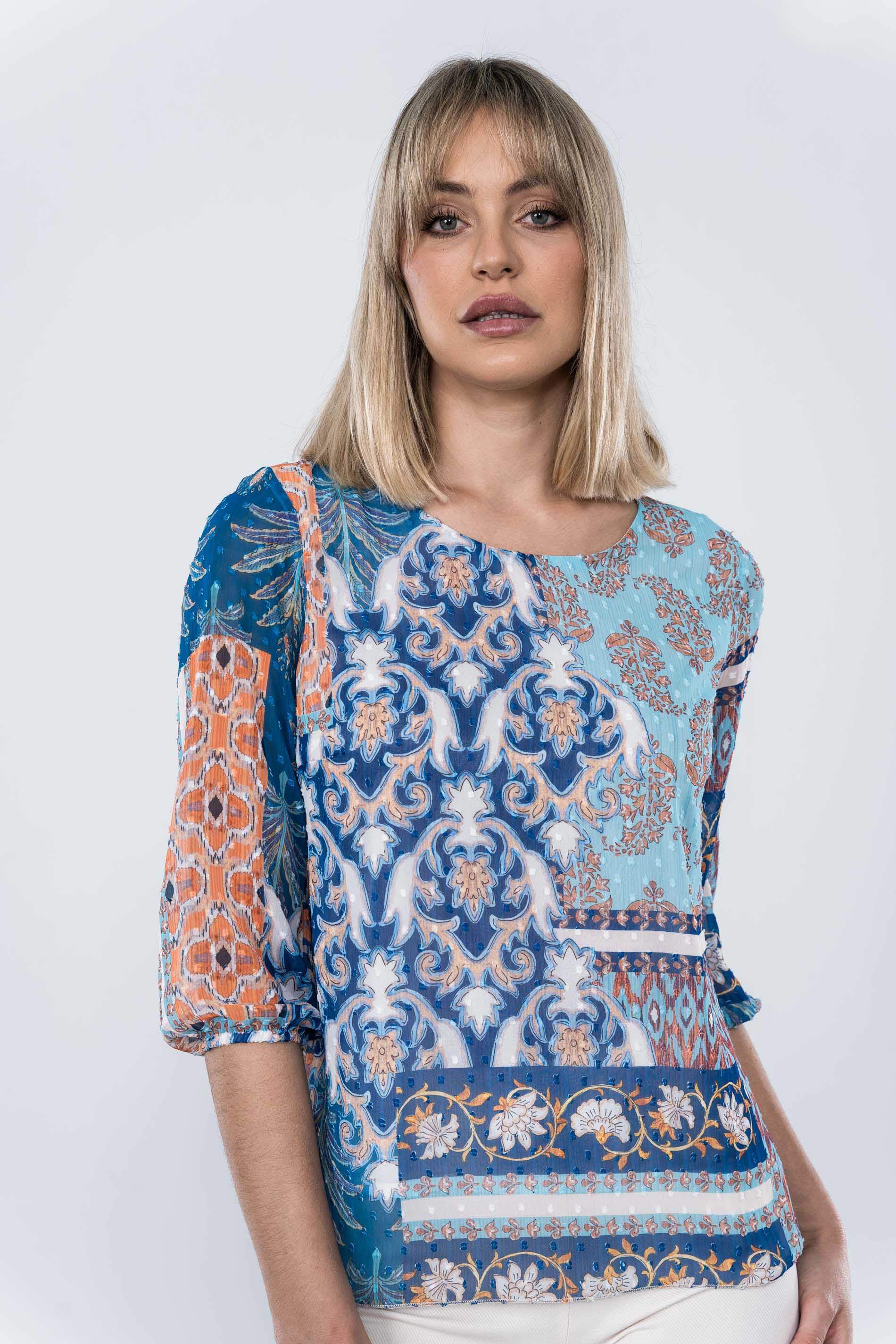 BLUSA PLUMETI CUELLO CAJA ESTAMPADO AZTECA