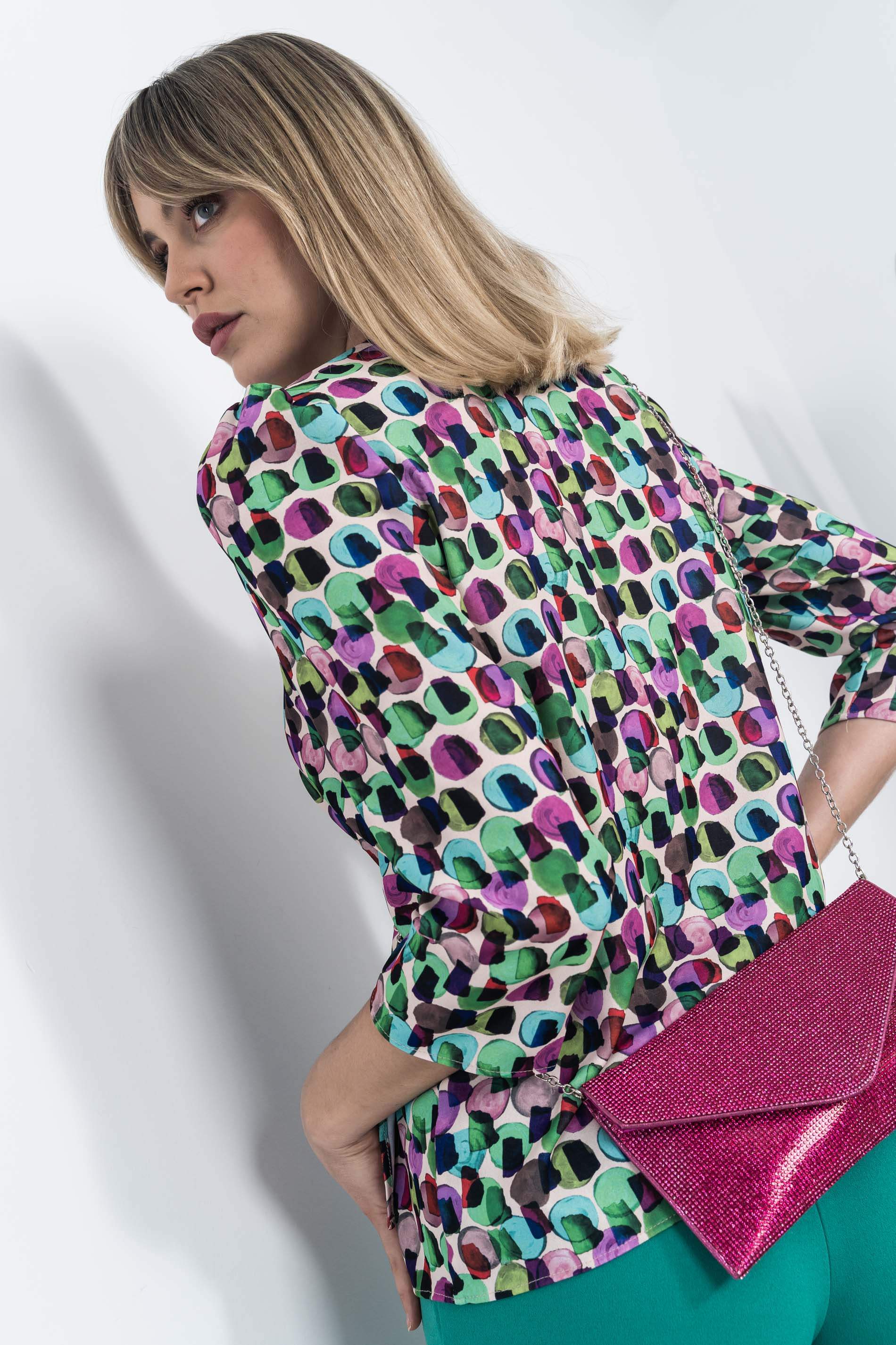 BLUSA ESTAMPADA RECOGIDO LATERAL