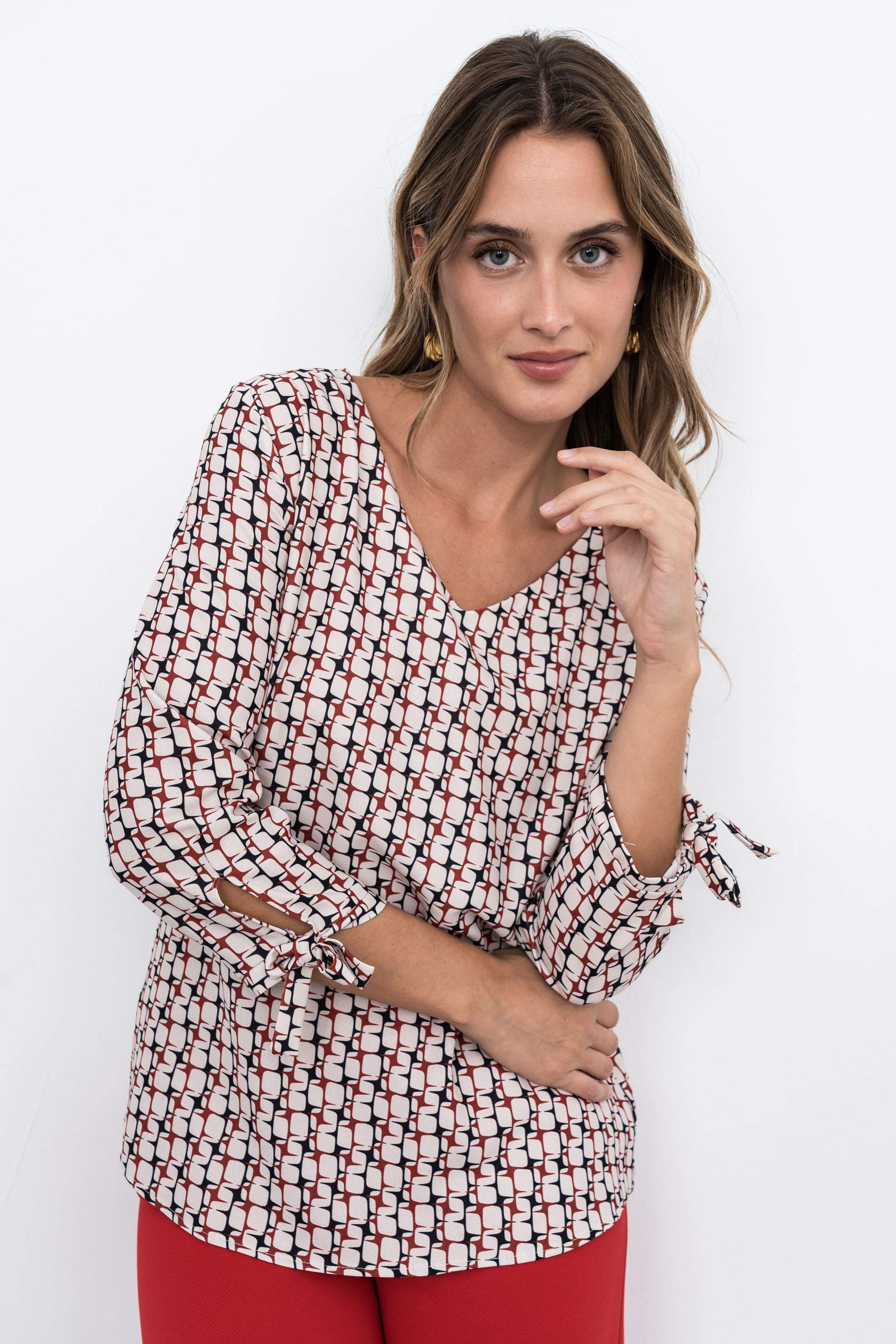 BLUSA GEOMÉTRICOS CUELLO PICO