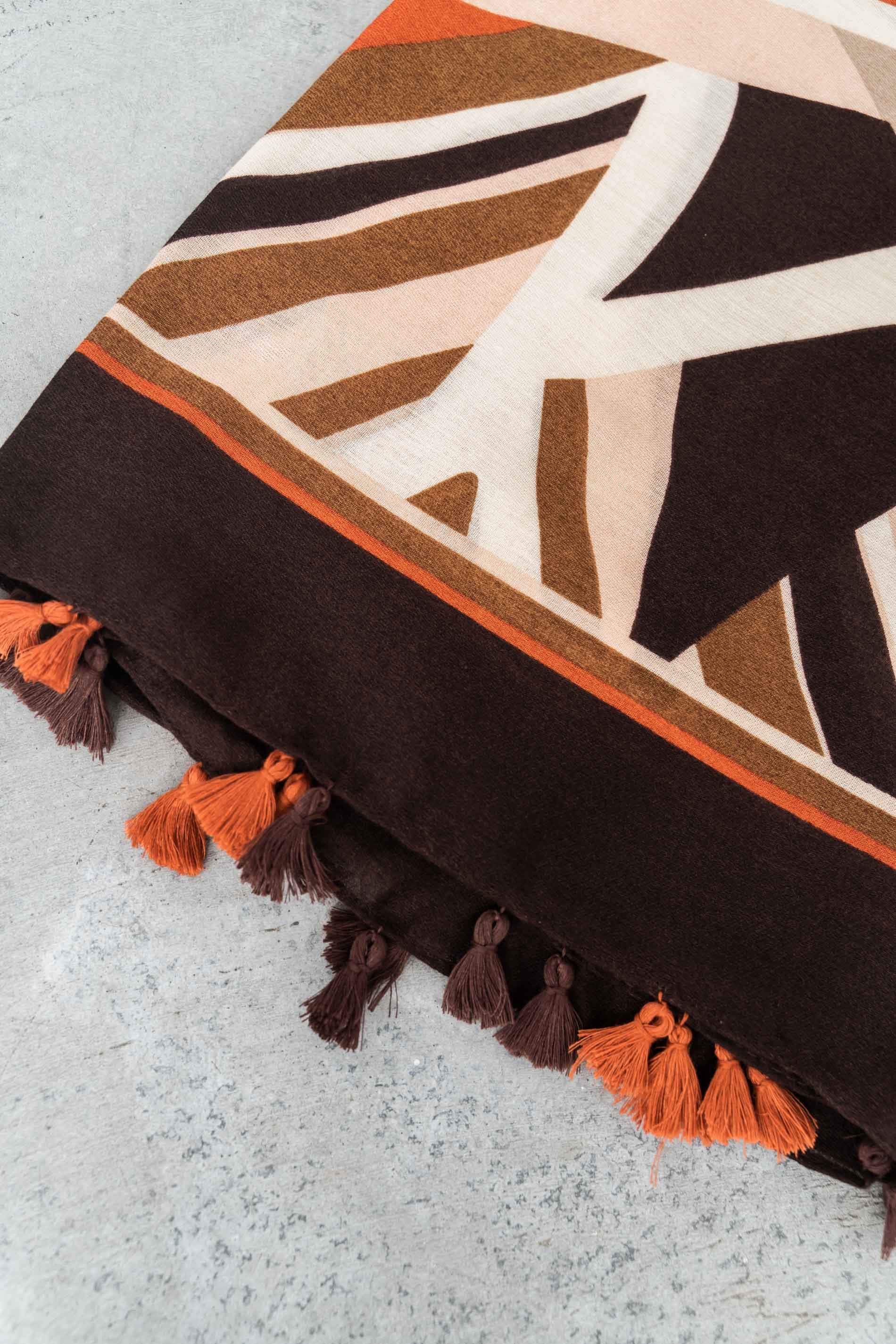 FOULARD GEOMÉTRICOS POMPONES CALDERA