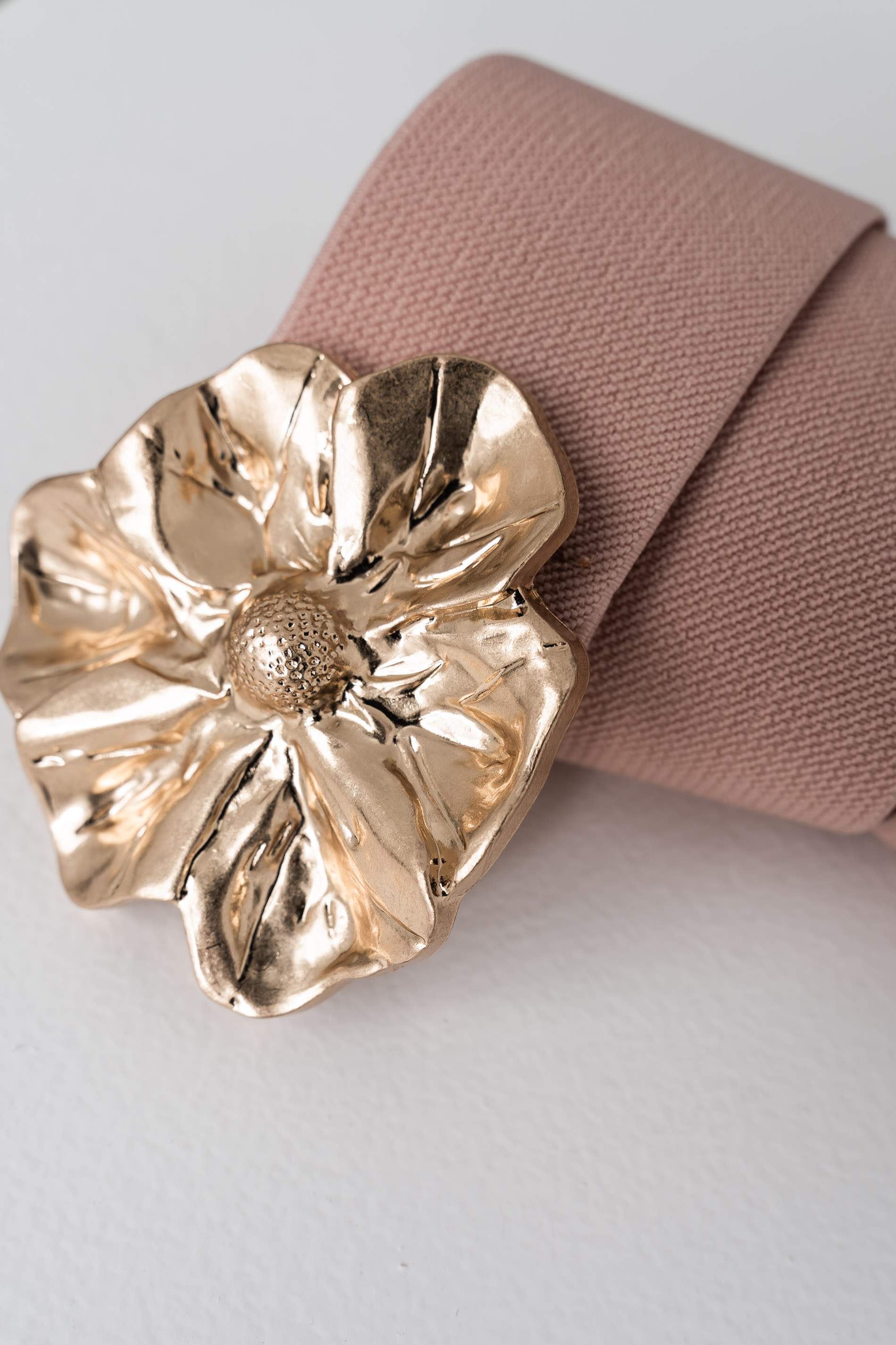 CINTURÓN ELÁSTICO FLOR METAL NUDE