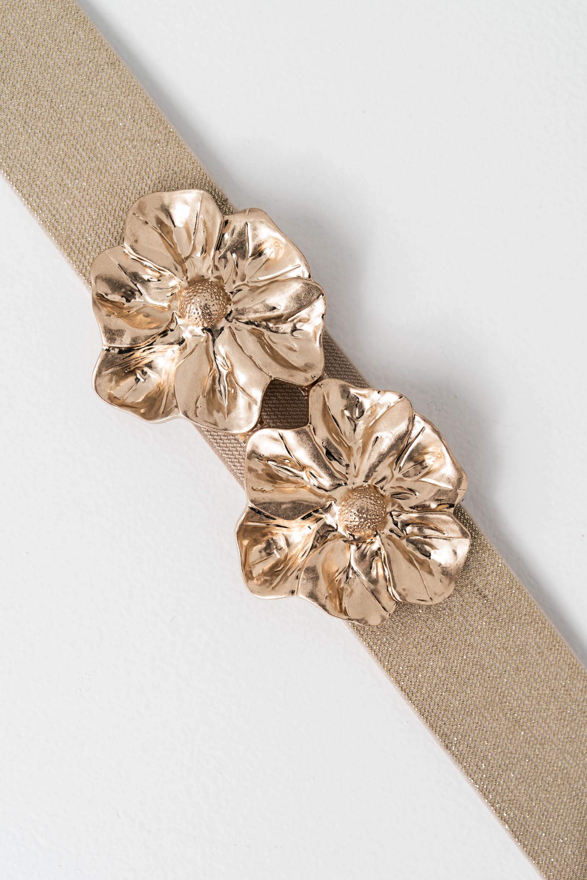 CINTURÓN ELÁSTICO FLOR METAL ORO