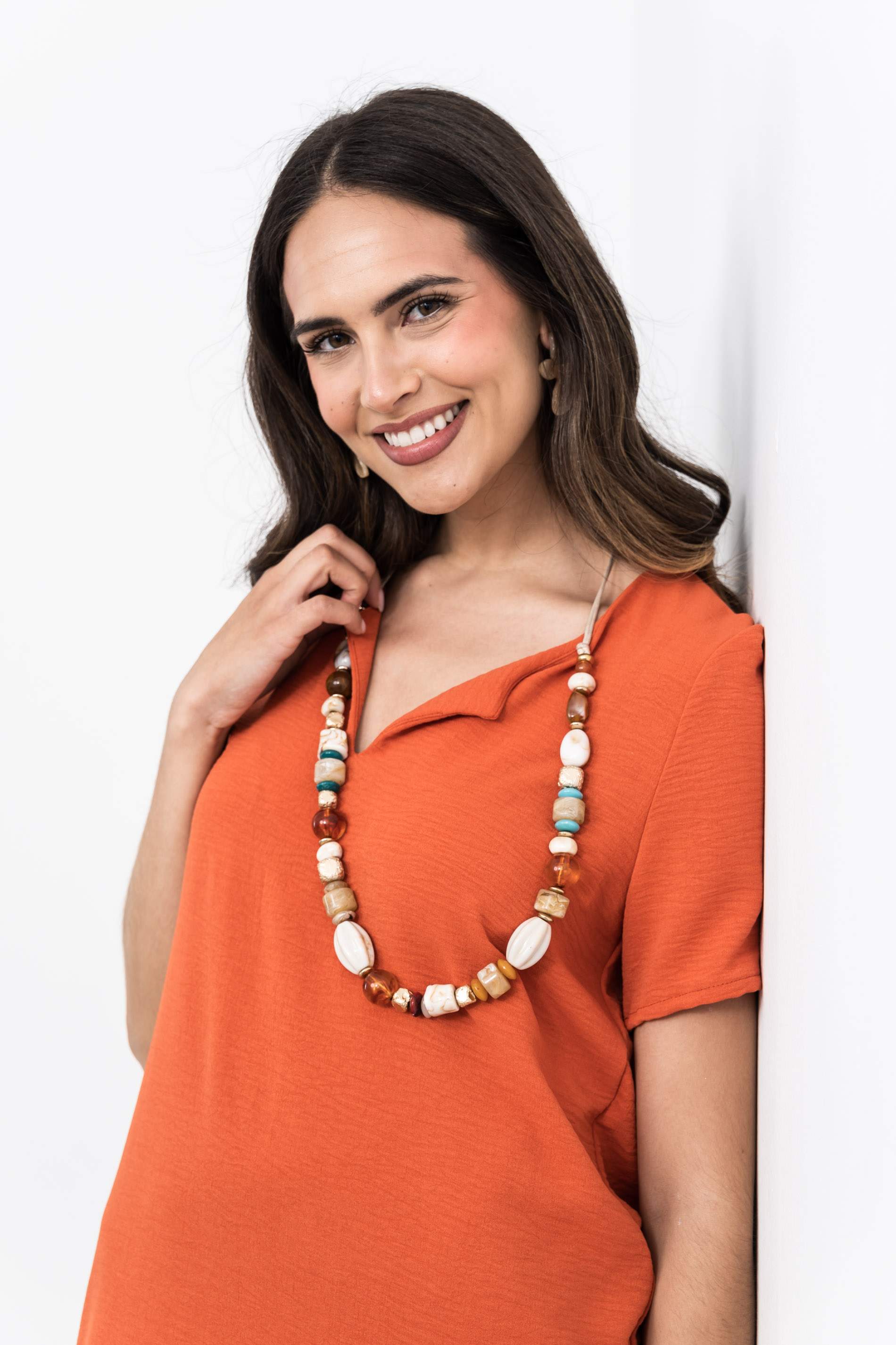 VESTIDO CUELLO UVE TEJA
