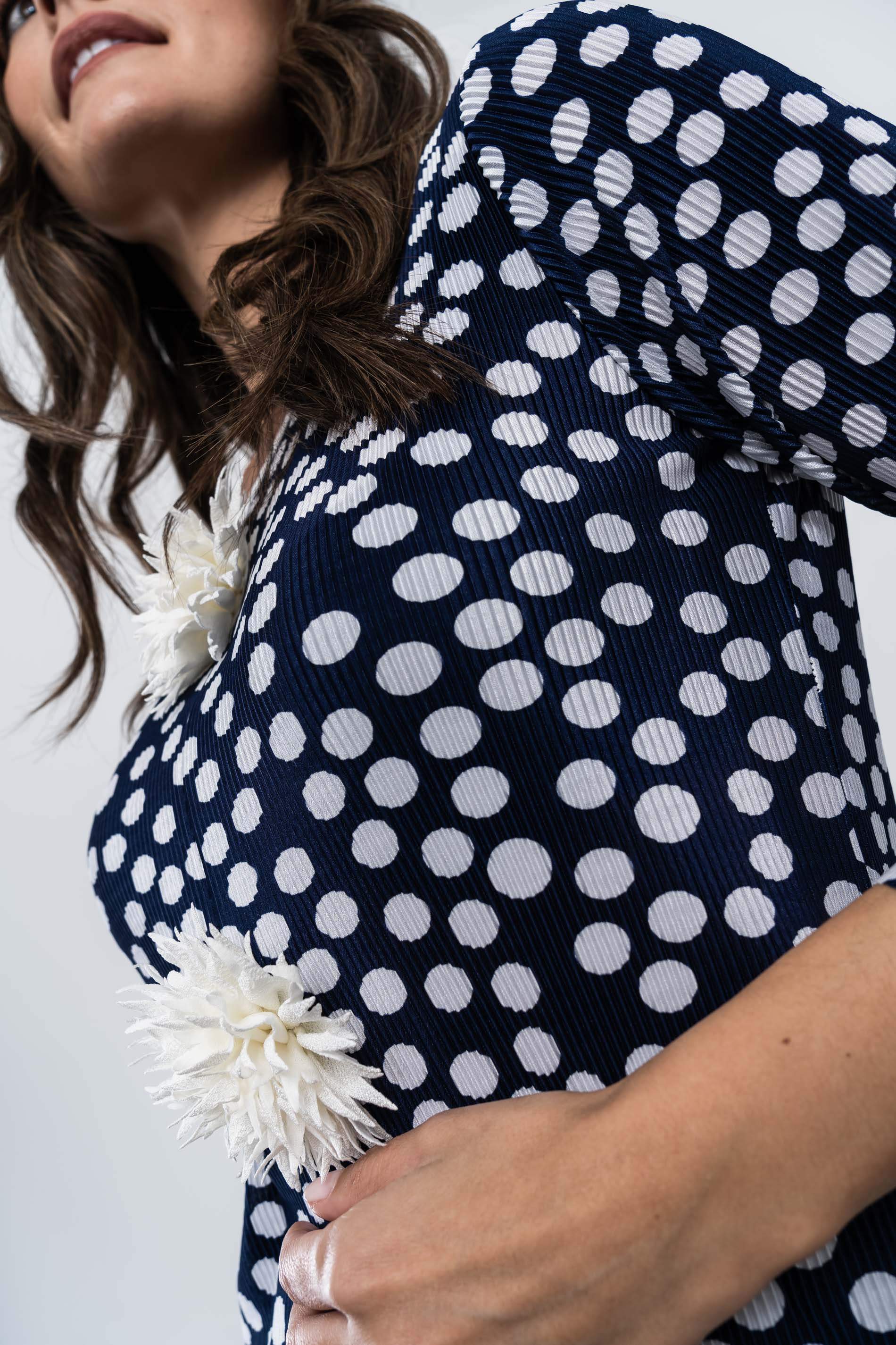 LEVITA PLISADA TOPOS