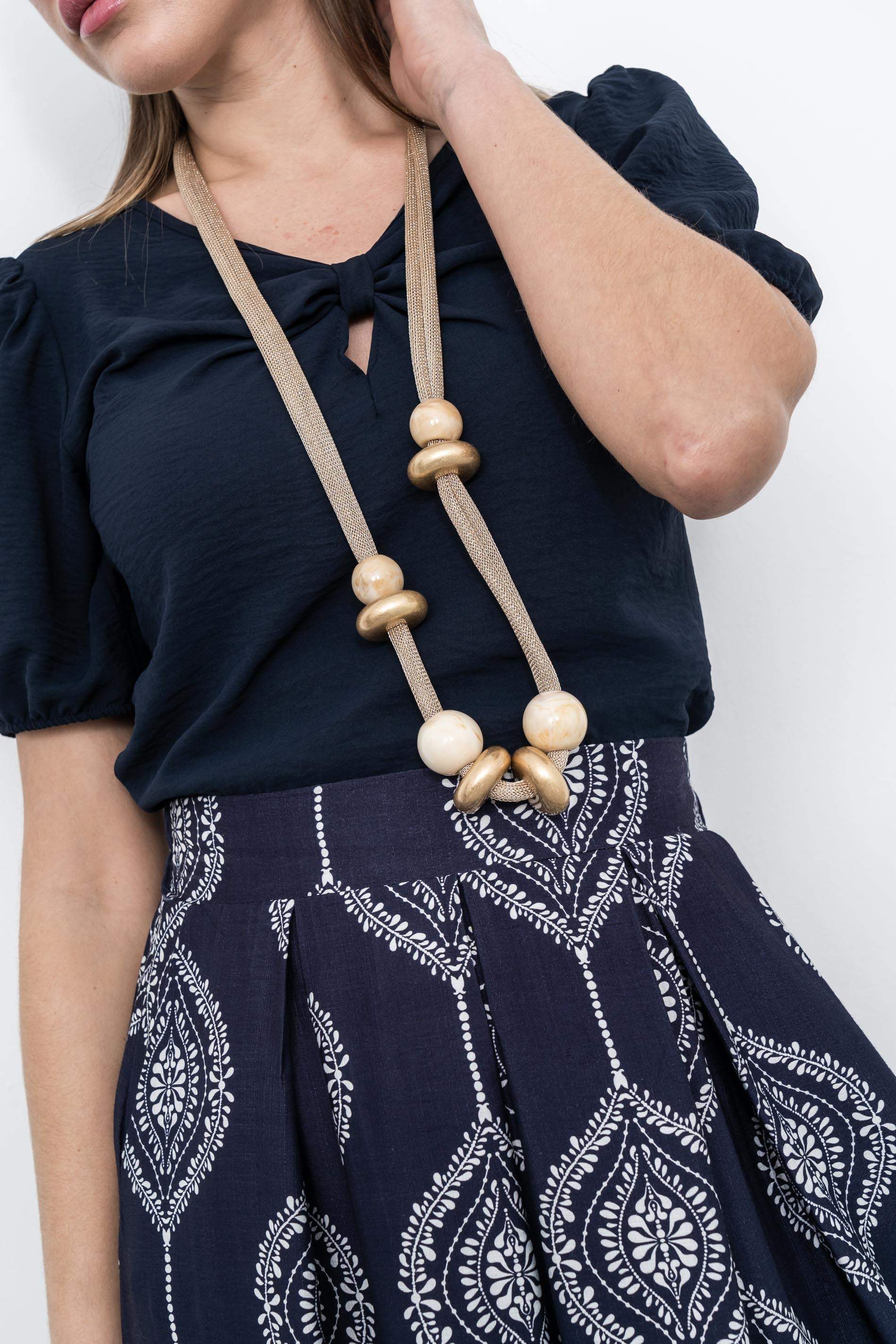 BLUSA DETALLE LAZO ESCOTE MARINO