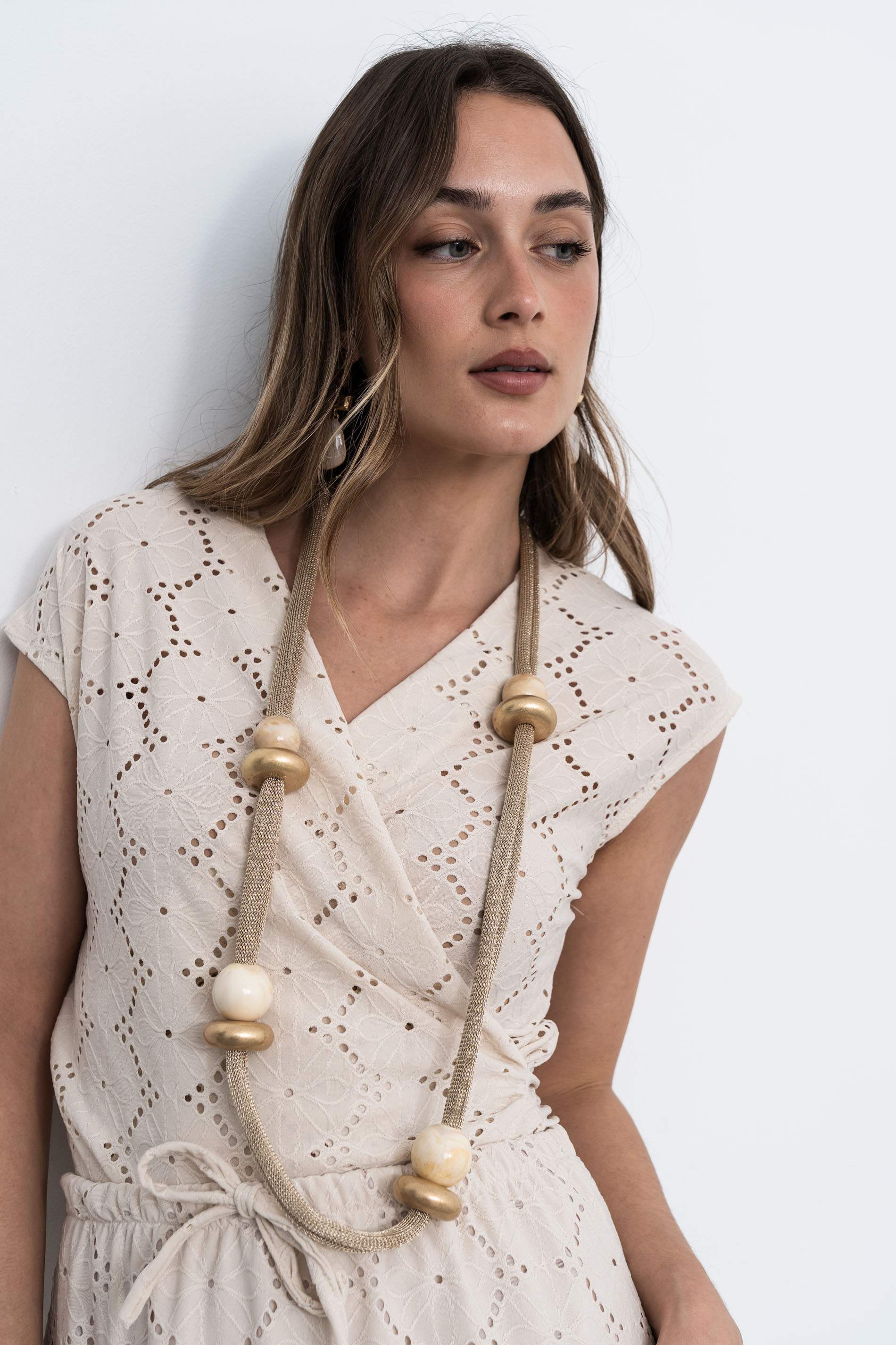 FALDA TEJIDO PERFORADO BEIGE