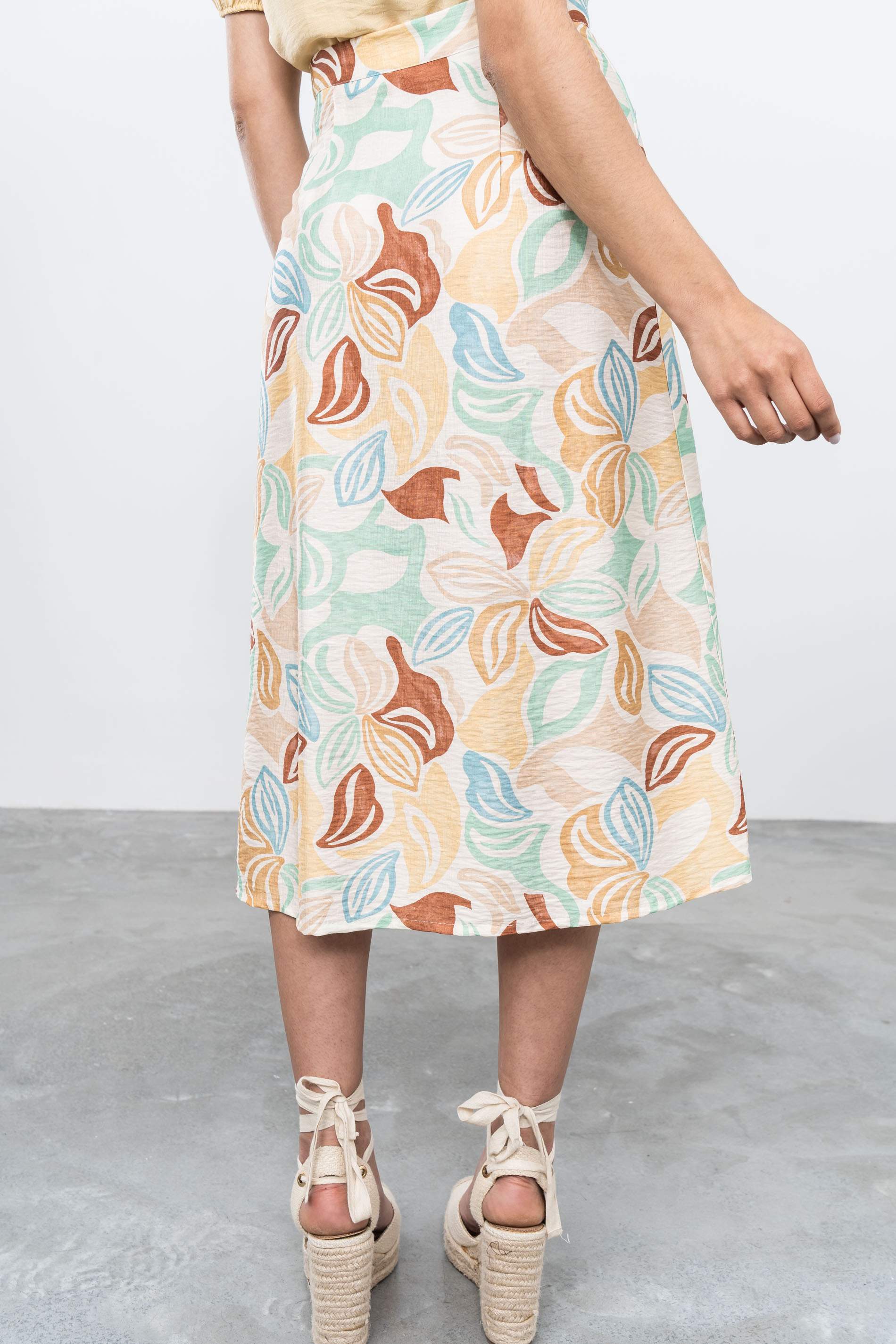 FALDA BOTONES HOJAS COLOR