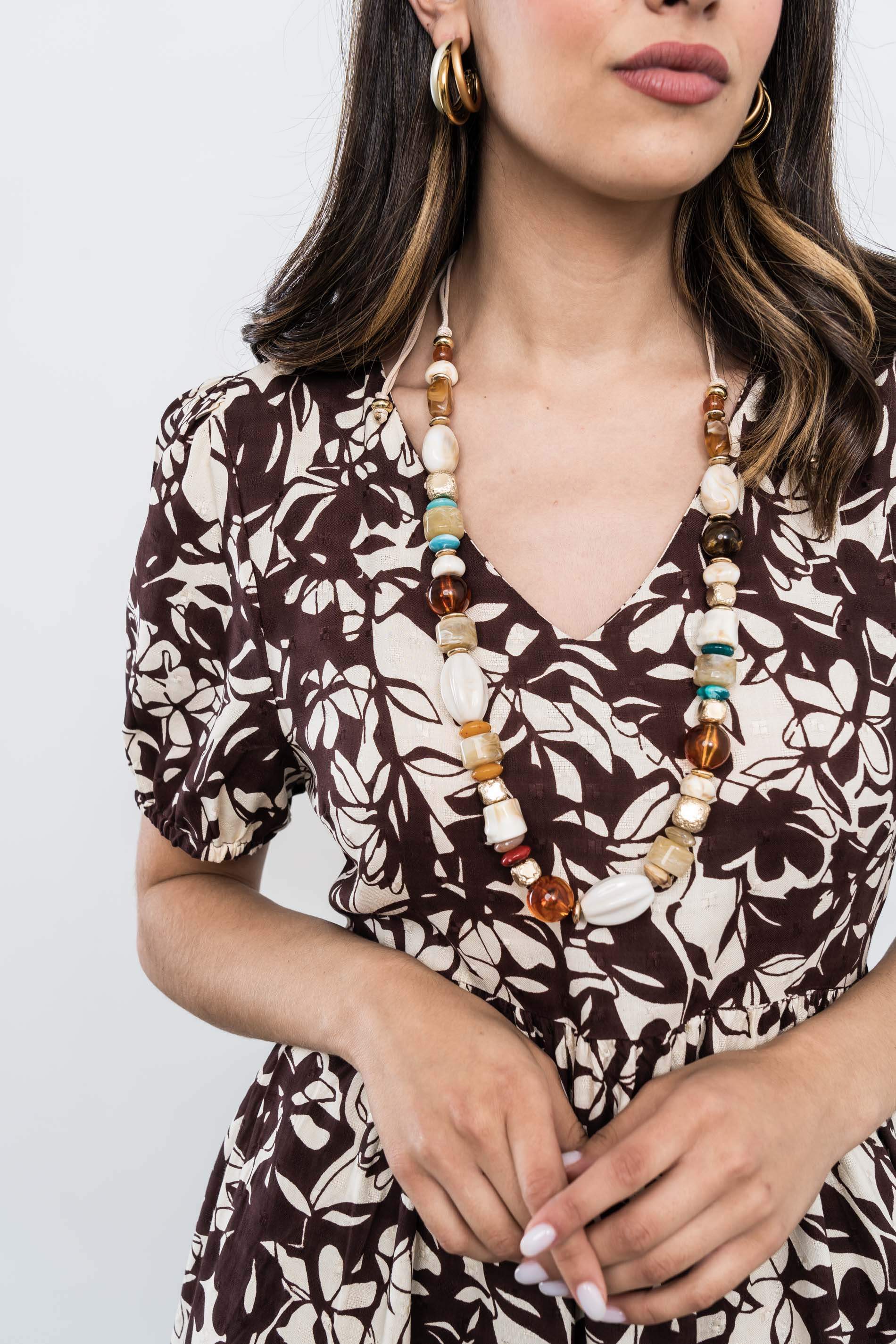 VESTIDO CORTE PECHO HOJAS