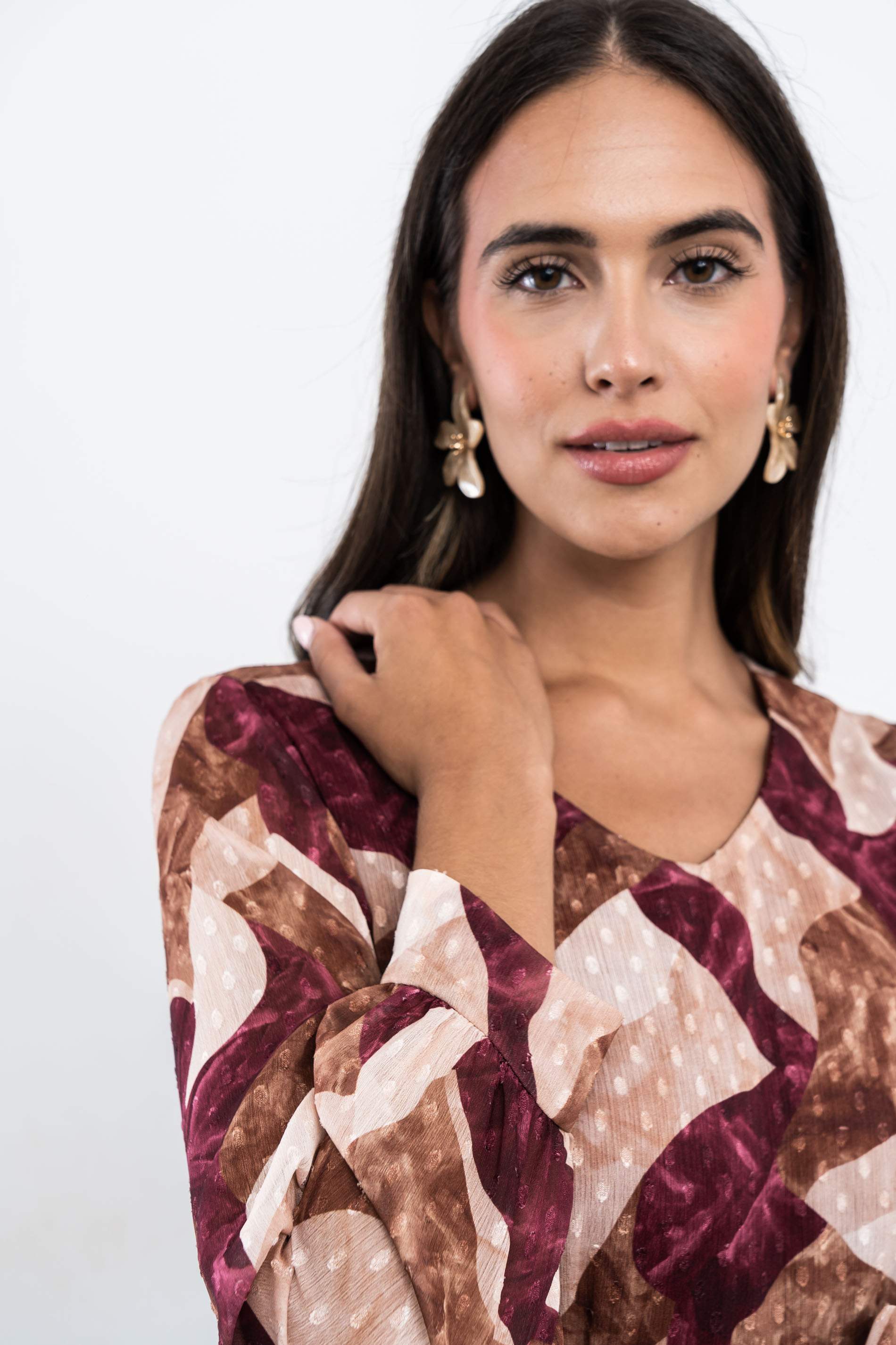 BLUSA PLUMETI MANGA ABULLONADA