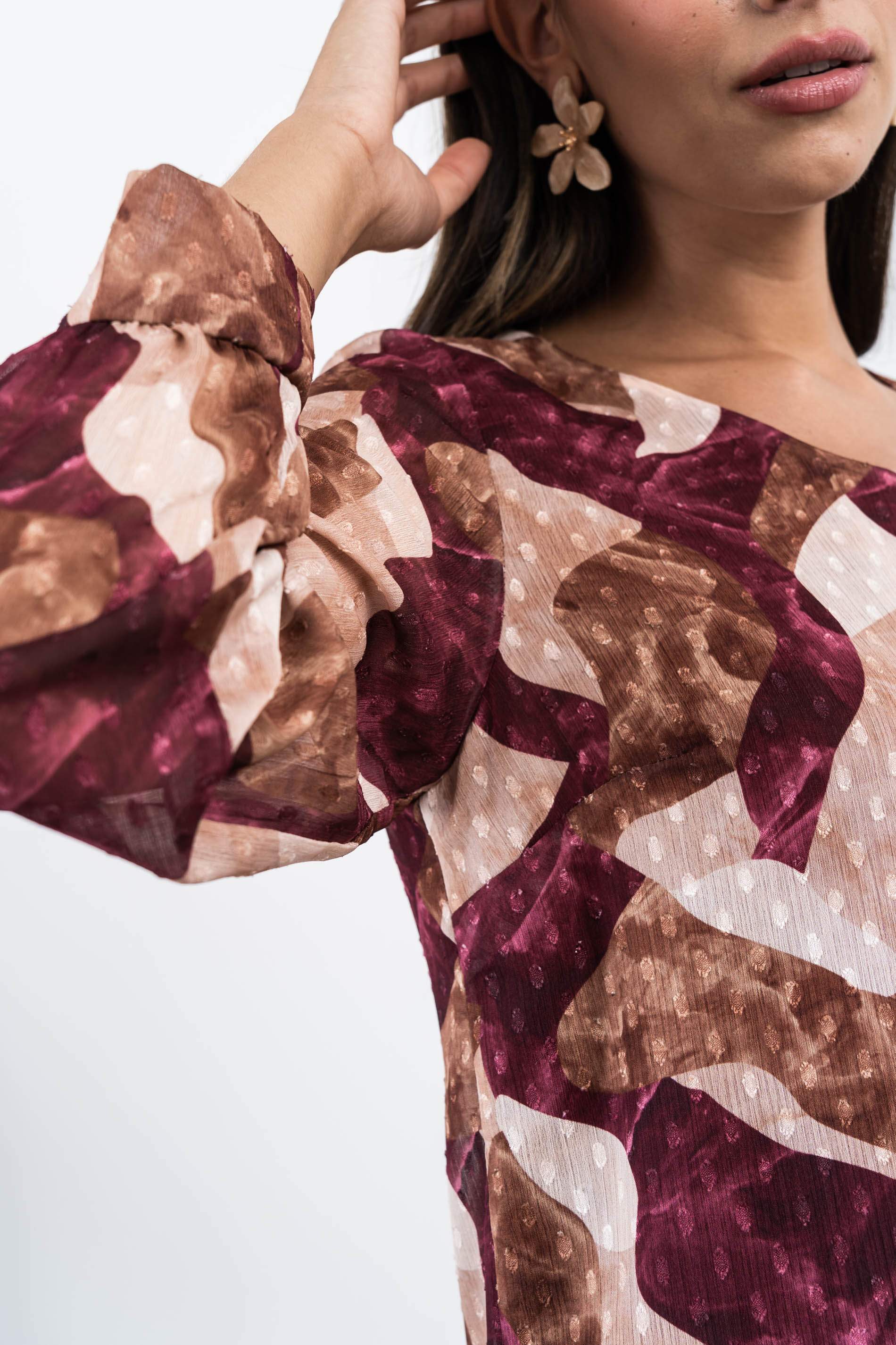 BLUSA PLUMETI MANGA ABULLONADA