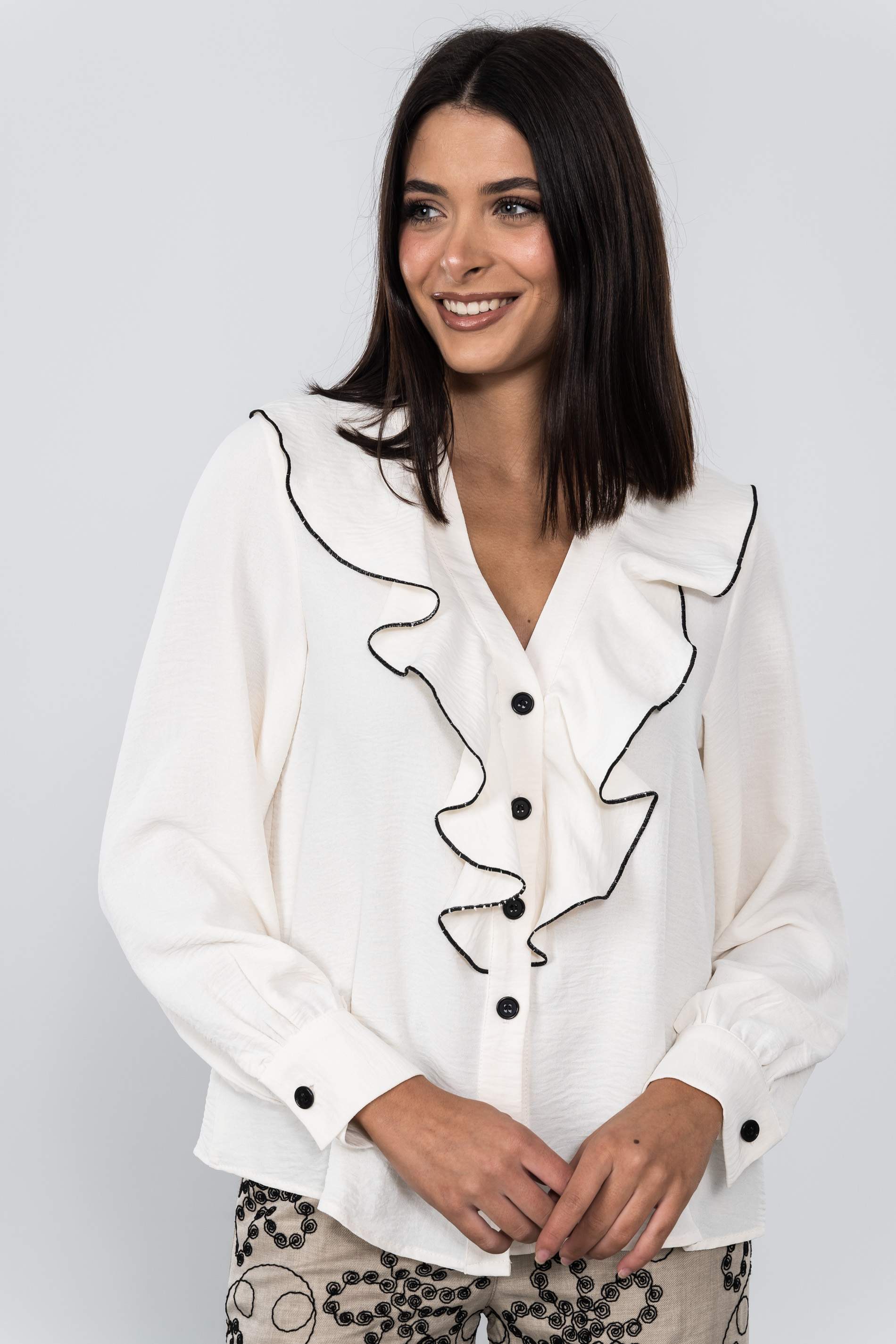 BLUSA VOLANTE CONTRASTE