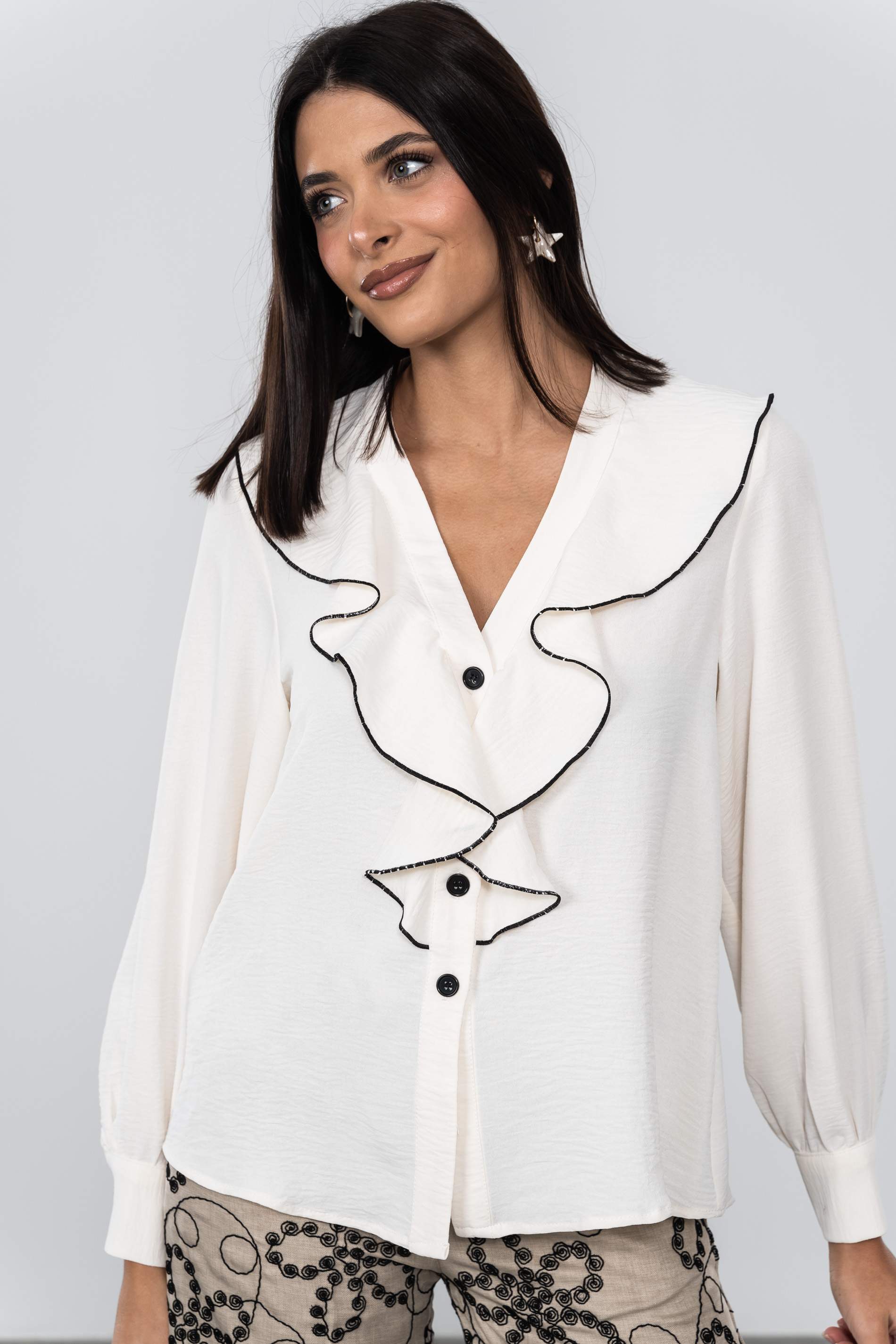 BLUSA VOLANTE CONTRASTE