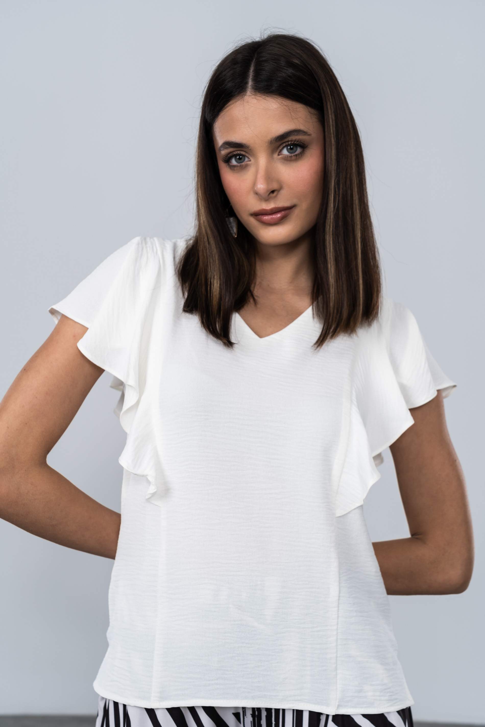 BLUSA CORTES VOLANTES MARFIL